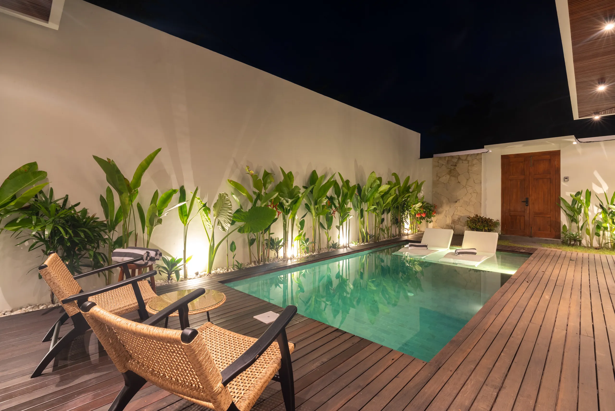 Villa exterior night view with illuminated interior and private pool at Villa Sofra